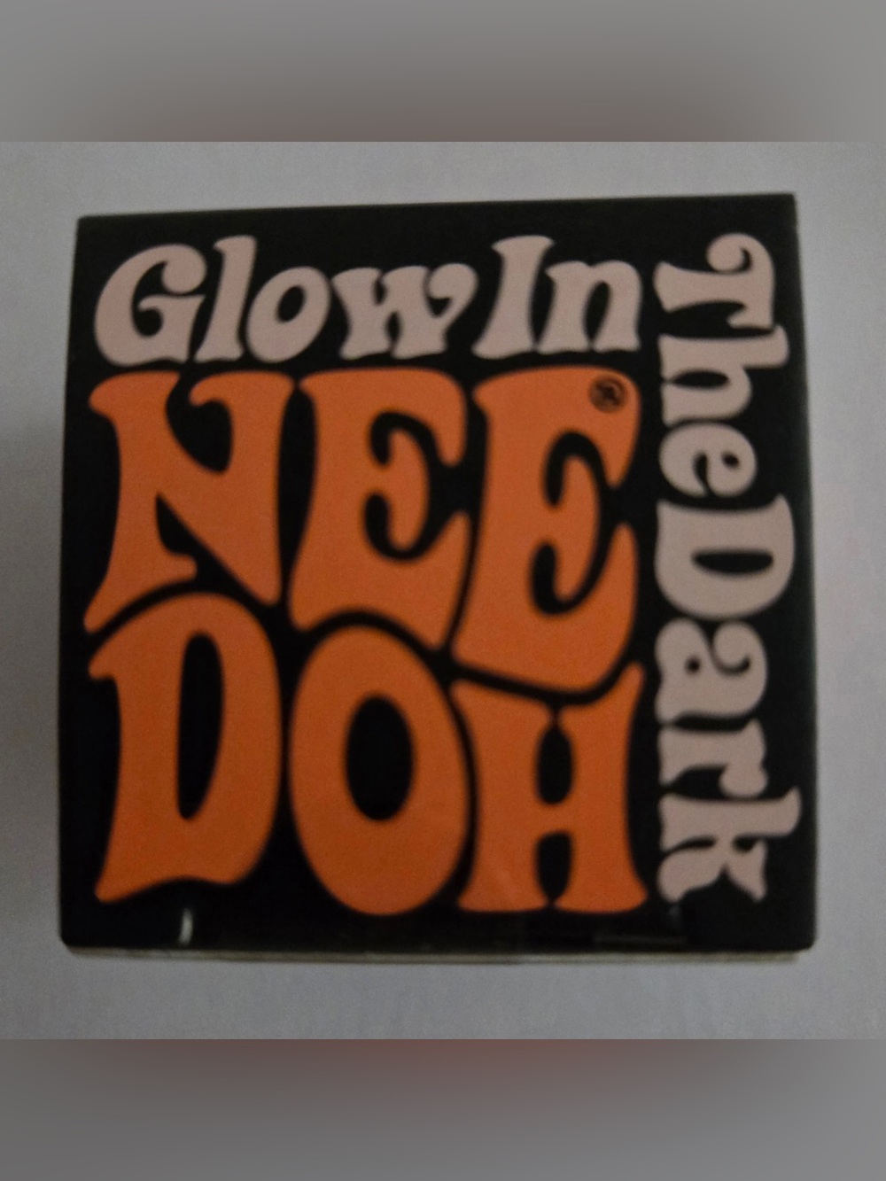 NeeDoh Glow in the Dark Groovy Glob Mini – Orange – Brand New
